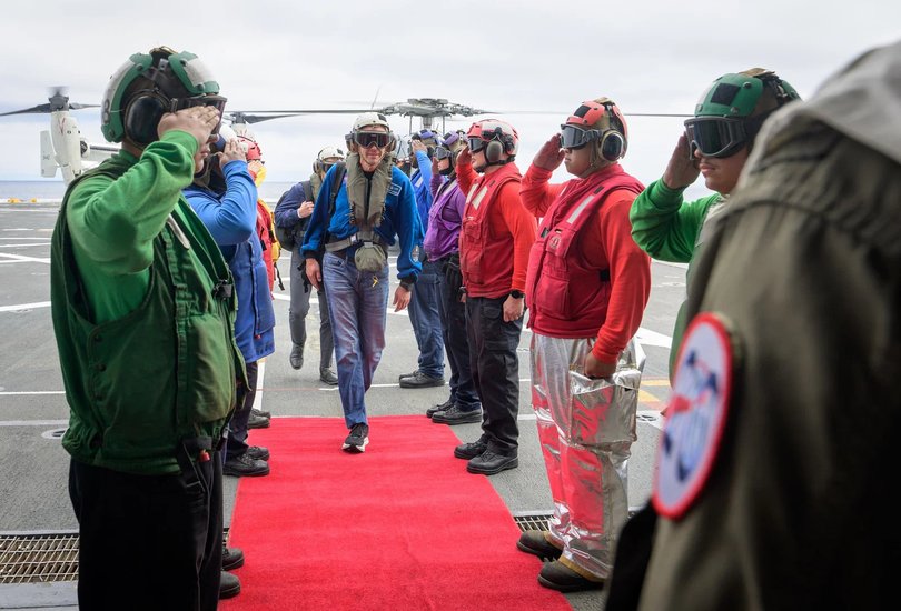 NASA Administrator Jared Isaacman greeted by Navy sailors onboard USS John P Murtha.