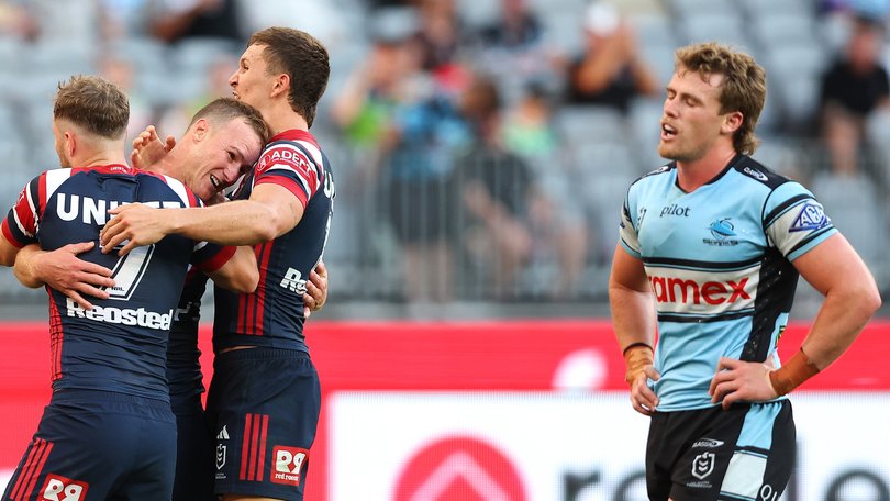 Daly Cherry-Evans of the Roosters celebrates a try.