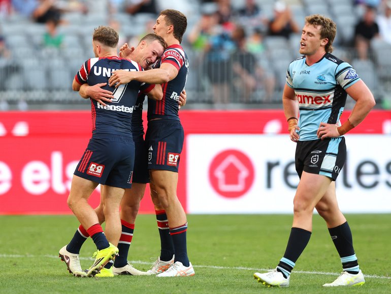 Daly Cherry-Evans of the Roosters celebrates a try.