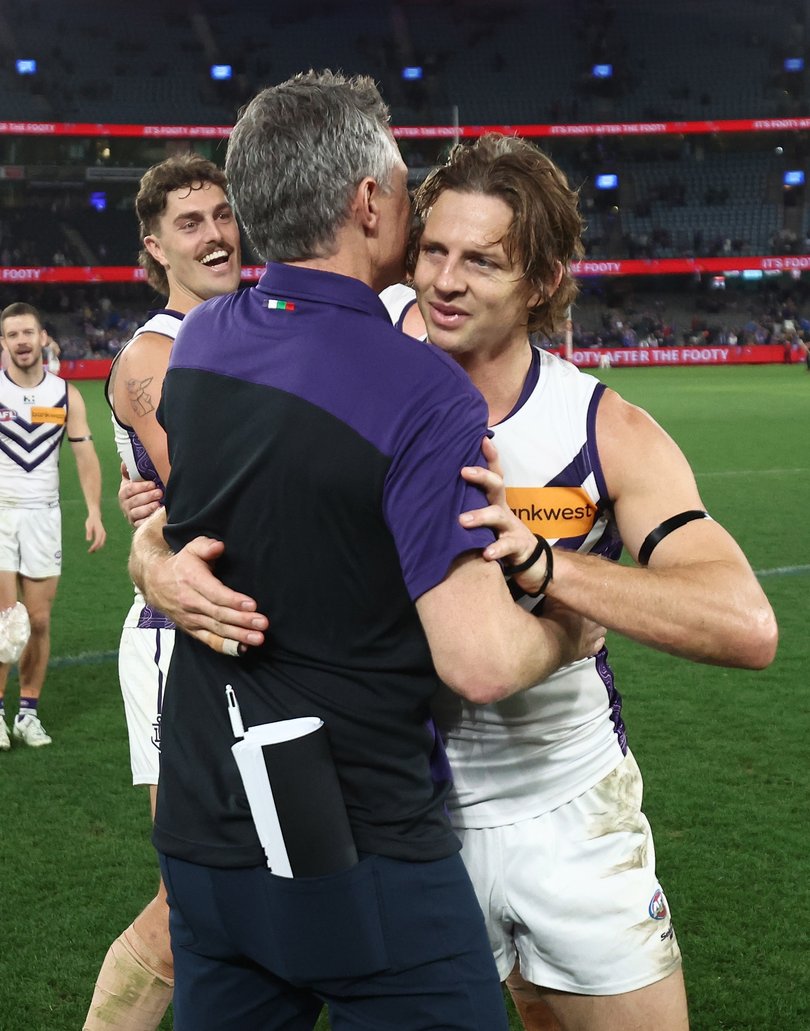 Justin Longmuir and Nat Fyfe.