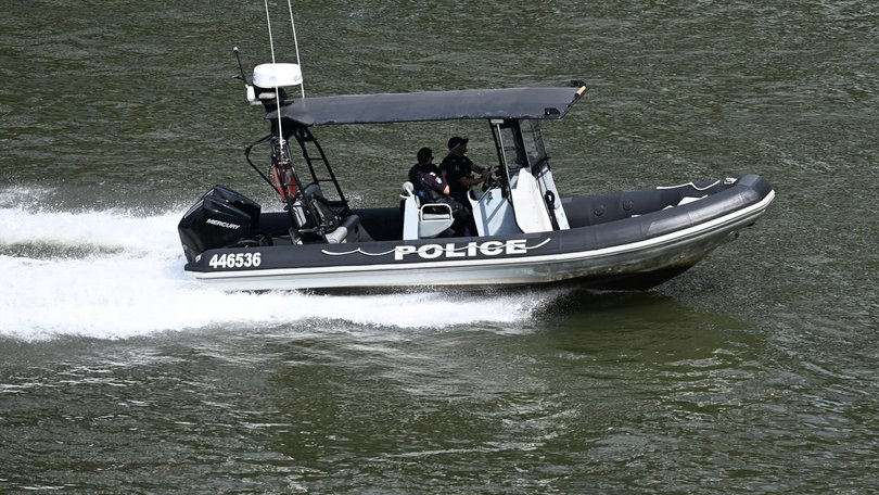 Queensland police mounted a rescue operation to find the missing swimmer. (Darren England/AAP PHOTOS)