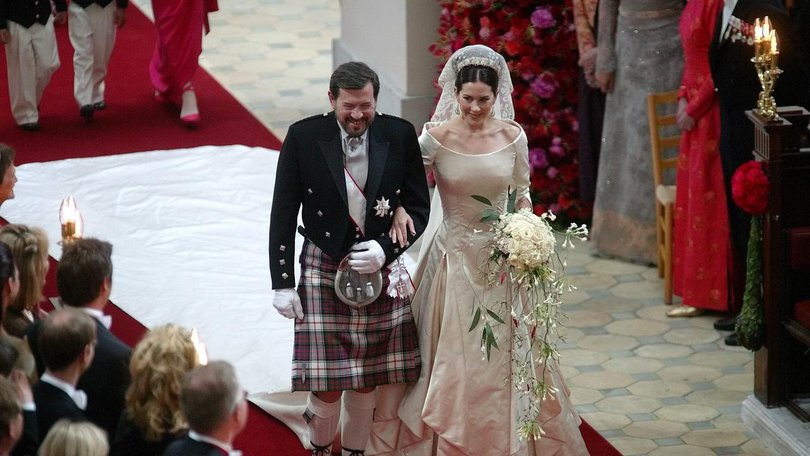 Mary's father, John Donaldson, beamed with pride as he walked his daughter down the aisle. 