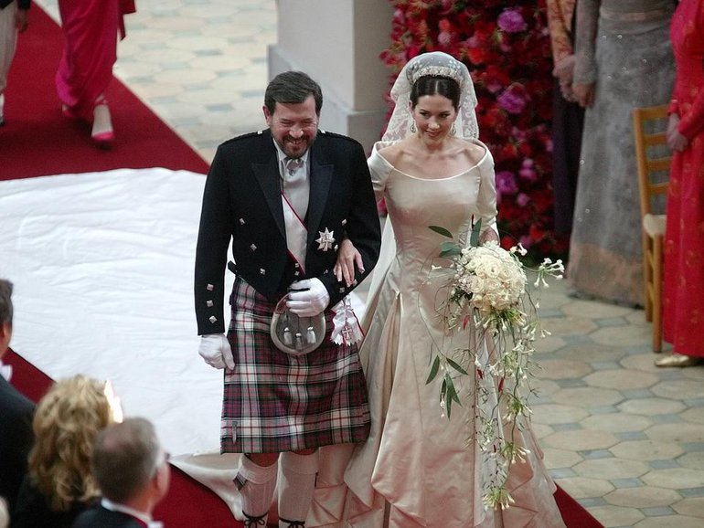 Mary's father, John Donaldson, beamed with pride as he walked his daughter down the aisle. 