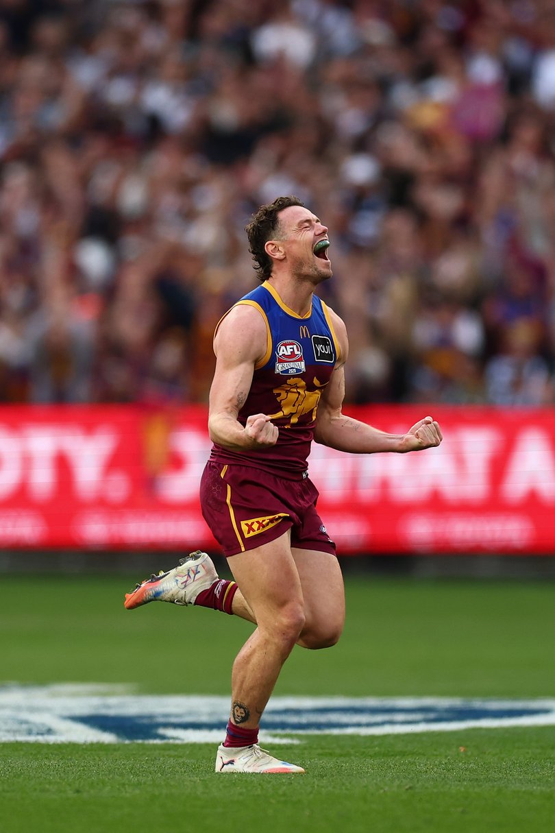 Lachie Neale of the Lions celebrates on the final siren after winning the AFL Grand Final.