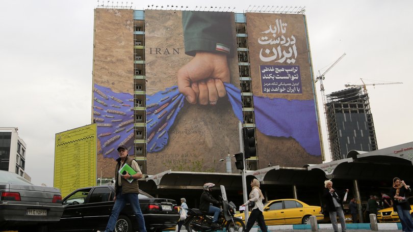 A large billboard in Tehran features messages stating that the Strait of Hormuz will remain under Iran’s control and that Donald Trump failed to achieve results.