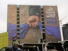 A large billboard in Tehran features messages stating that the Strait of Hormuz will remain under Iran’s control and that Donald Trump failed to achieve results.
