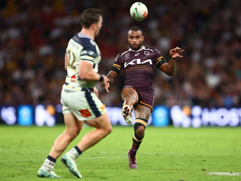 BRISBANE, AUSTRALIA - APRIL 10: Ezra Mam of the Broncos kicks the ball during the round six NRL match between the Brisbane Broncos and North Queensland Cowboys at Suncorp Stadium on April 10, 2026 in Brisbane, Australia. (Photo by Chris Hyde/Getty Images)