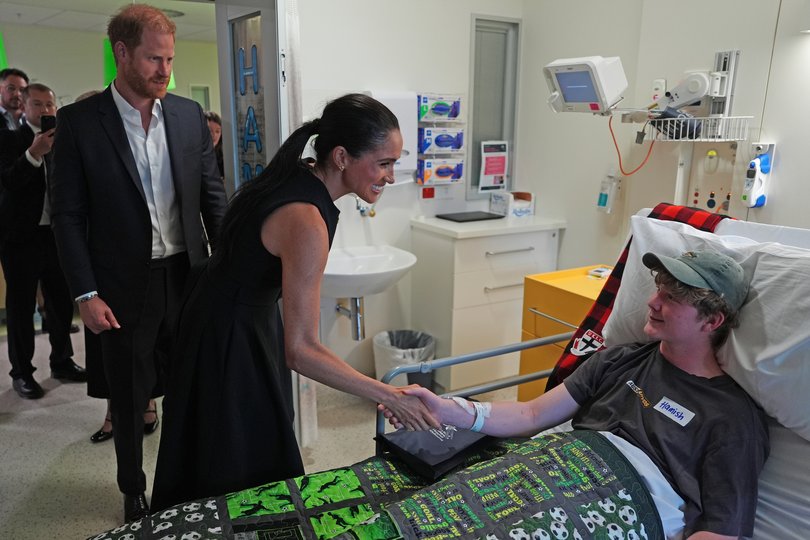 Meghan and Prince Harry visit patient Hamish at the Royal Children's Hospital.