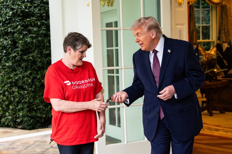 US President Donald Trump tips Sharon Simmons, a DoorDash worker, outside the Oval Office of the White House in Washington, DC, US, on Monday, April 13, 2026. Trump is highlighting the "No Tax on Tips" policy, which allows eligible workers to deduct qualified tips from their federal income taxes as part of the One Big Beautiful Bill Act. Photographer: Salwan Georges/Bloomberg Picture: Salwan Georges