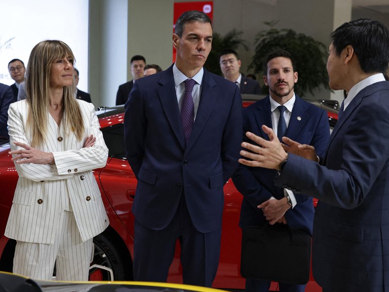 Spain's Prime Minister Pedro Sanchez and his wife Begona Gomez at the Xiaomi headquarters Beijing on Monday.