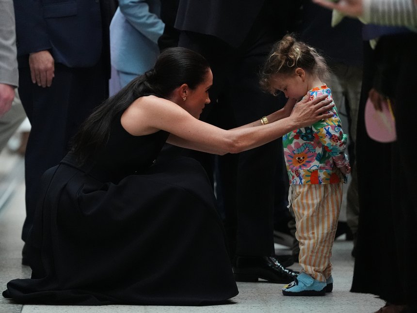 Meghan meets a young patient.