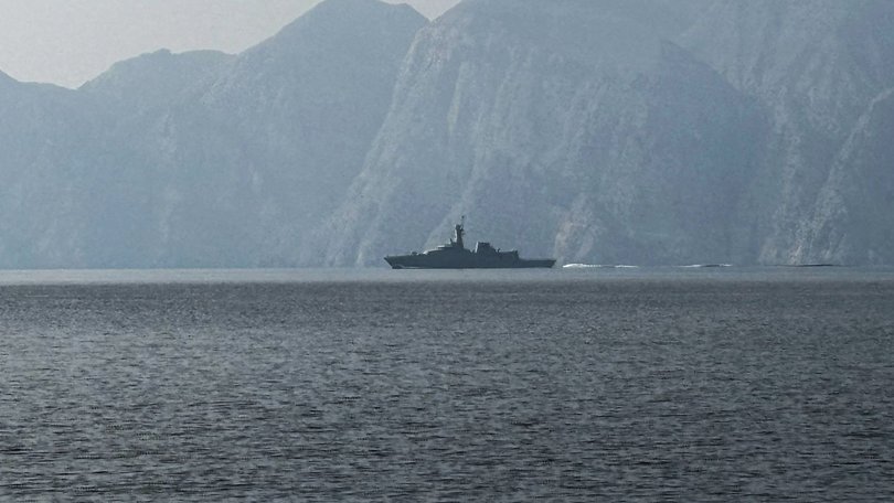 A navy vessel is seen sailing in the Strait of Hormuz.