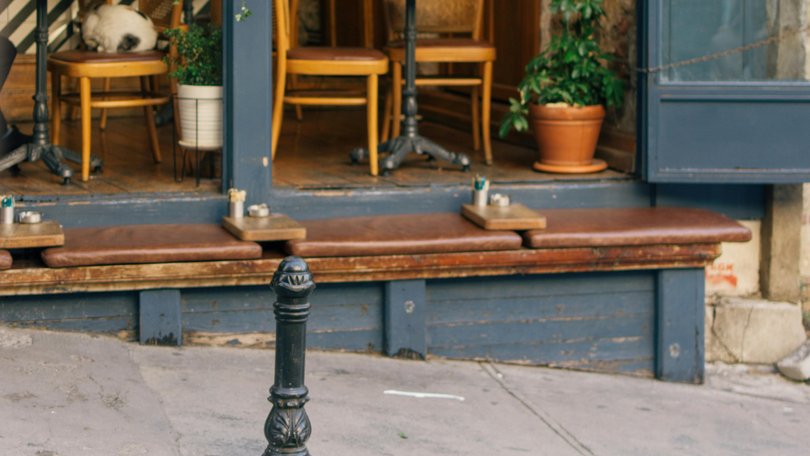 A woman has been caught in a compromising position that shocked cafe goers.