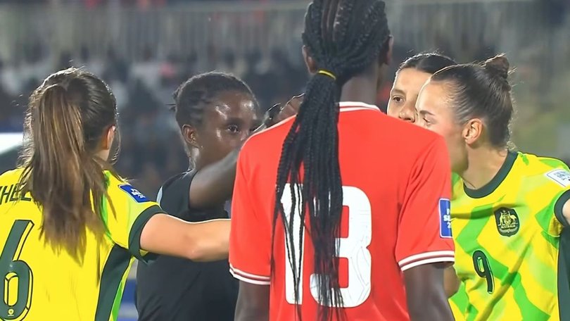 Caitlin Foord and her teammates argue with the ref after a Matildas goal was disallowed.