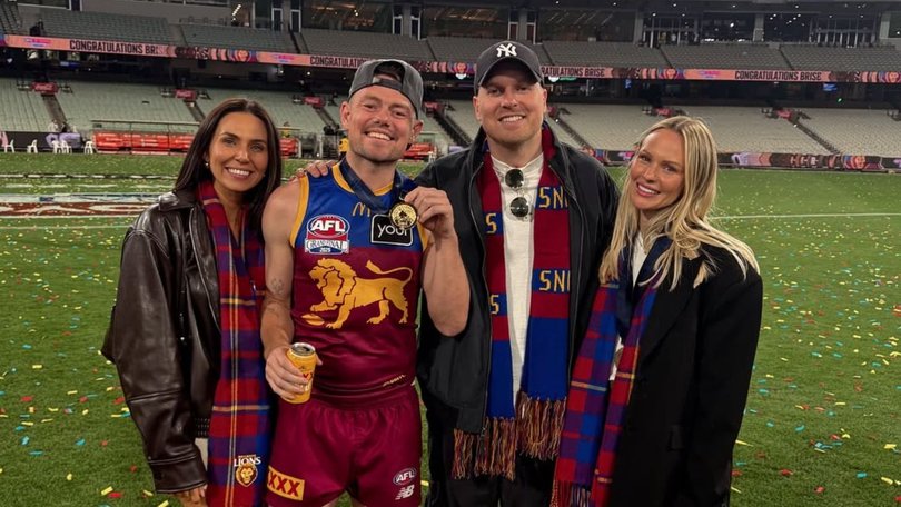 Tess Crosley, Lachie Neale, Ben Crosley and Jules Neale after the AFL grand final.