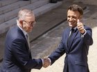 French President Emmanuel Macron, right, and Australian Prime Minister Anthony Albanese shake hands after addressinf reporters Friday, July 1, 2022 at the Elysee Palace in Paris. Australia and France opened a "new chapter" in relations as the new Australian prime minister seeks to heal wounds caused by a secret submarine contract that infuriated France. (AP Photo/ Thomas Padilla)