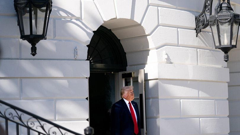 President Donald Trump exits the White House in Washington, April 11, 2026. 