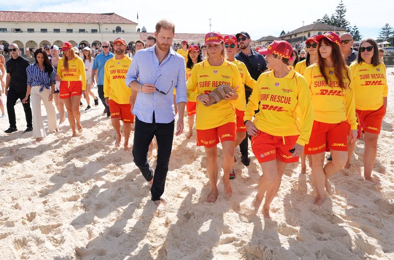 Harry and Meghan with surf life savers from Bondi Surf Bathers' Life Saving Club.