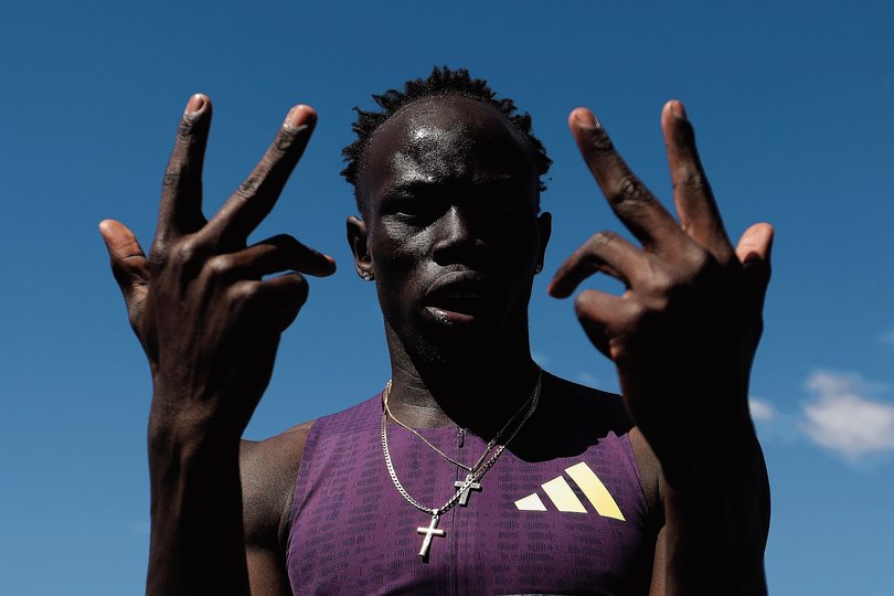 Gout Gout celebrates after breaking the World Junior Record and Australian Record and a PB to win the Men's 200m final