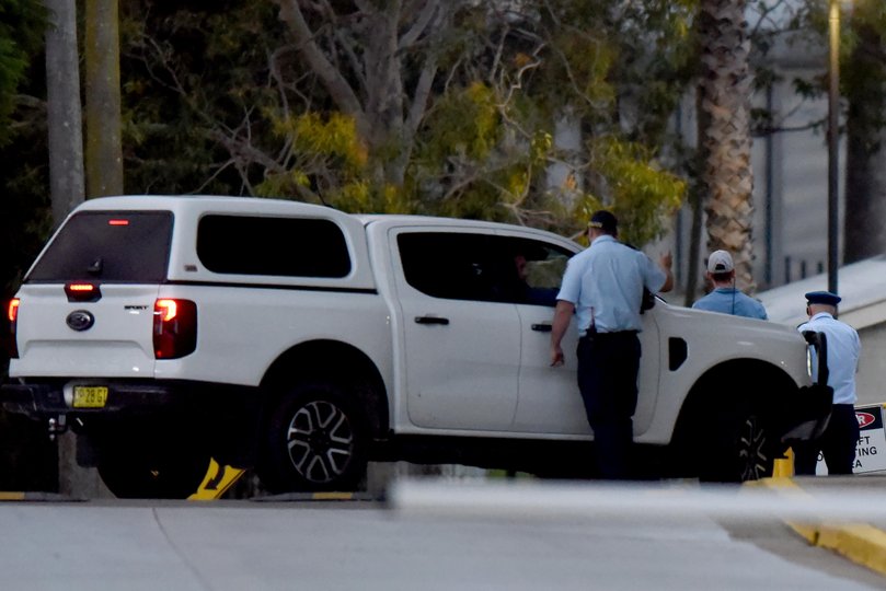 Ben Roberts-Smith is escorted out by correctional officers at Silverwater Correctional Complex