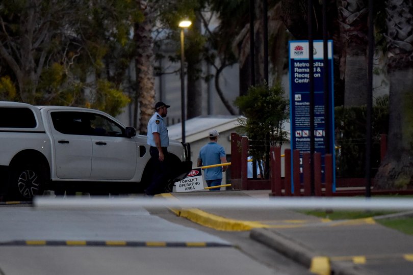 Ben Roberts-Smith is escorted out by correctional officers at Silverwater Correctional Complex.