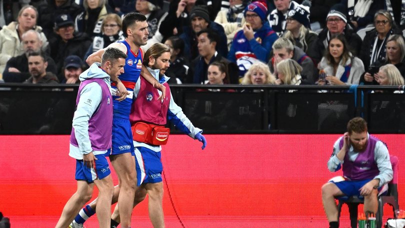 Western Bulldogs star Sam Darcy left the field after injuring his left knee against the Cats. 