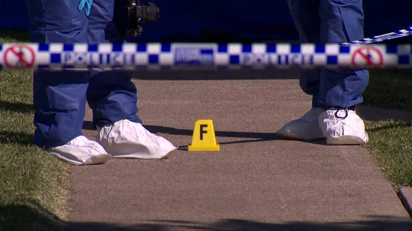 Evidence markers on a footpath.