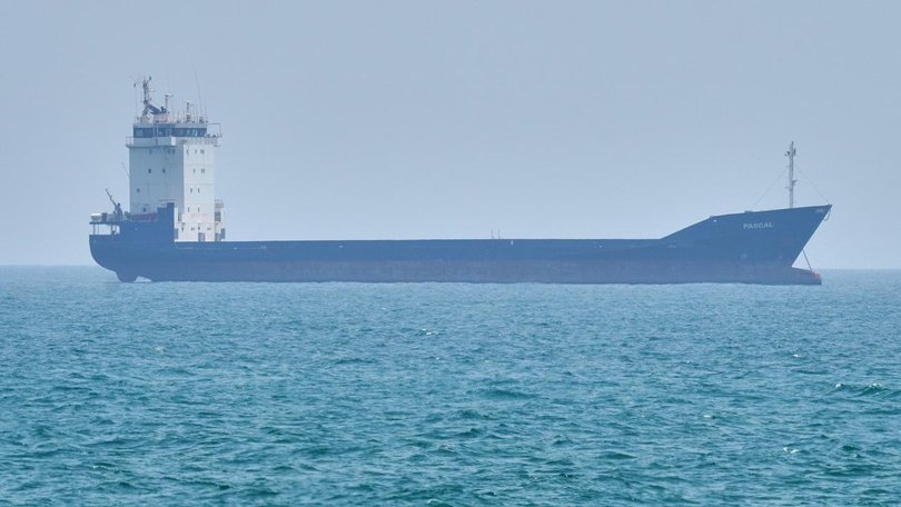 A US navy destroyer has fired on an Iranian-flagged cargo ship in the Gulf of Oman. (AP PHOTO)