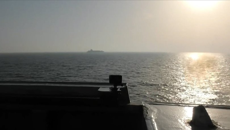 Guided-missile destroyer USS Spruance fires on the Touska.