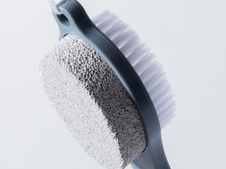 A pumice stone and brush, one way to care for feet. It’s almost sandal season, which means it’s time to get your feet in shape.