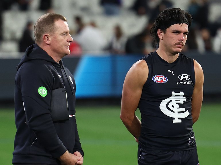 Michael Voss with Elijah Hollands last Thursday night.