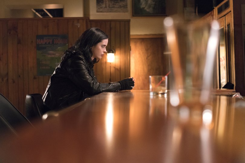 Krysten Ritter in the original 2015 Jessica Jones series. The character was portrayed as a hard drinker, an unusual move for a superhero figure.