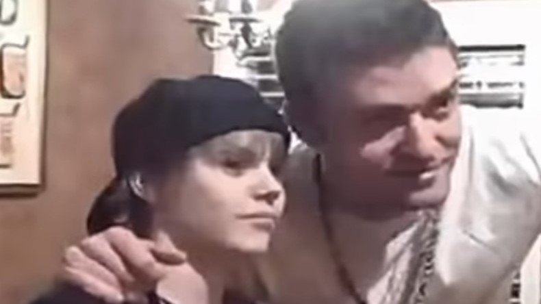 Justin Timberlake poses for a photo with a young Justin Bieber.