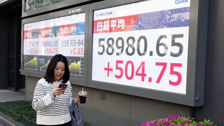 Japan's Nikkei is down 0.2 per cent as traders consolidate their recent gains. (EPA PHOTO)