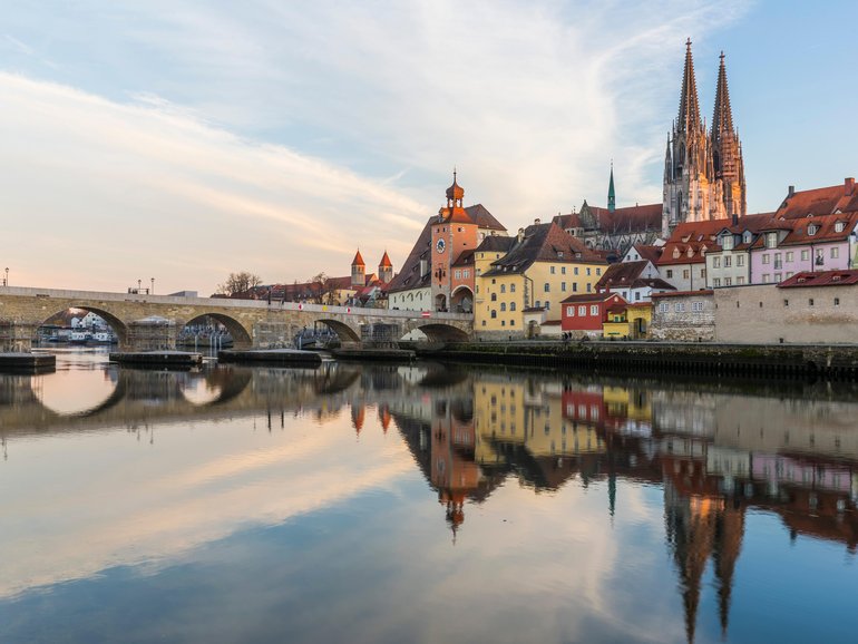 View of the Stone Bridge, St. Peter's Church and the Old Town of Regensburg, Germany.