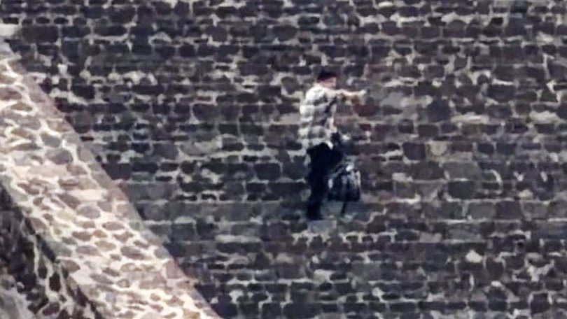 Julio Cesar Jasso Ramirez  fires a weapon  at the Teotihuacan pyramids, a popular tourist and archaeological site in San Martin de las Piramides, on the outskirts of Mexico City.