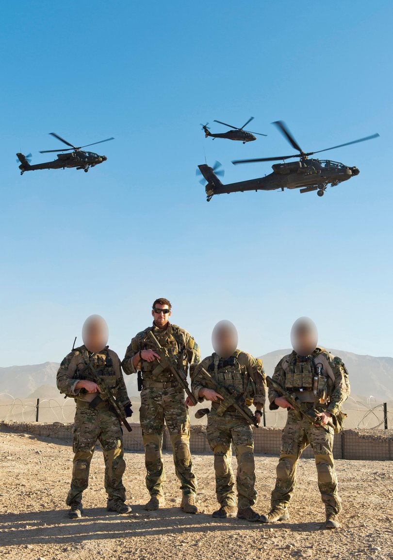 SAS corporal Ben Roberts-Smith and three members of his team, Gothic 2, in Afghanistan in 2012. US Black Hawk and Apache helicopters fly overhead.