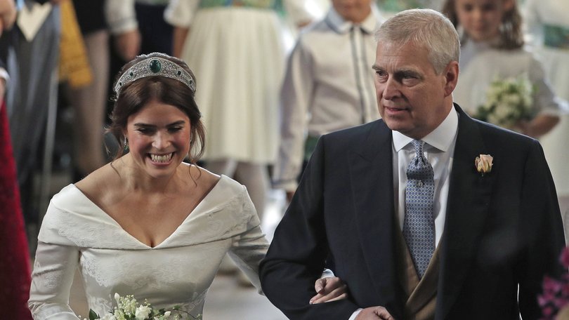 Princess Eugenie  walks down the aisle with her father, Andrew Mountbatten-Windsor for her wedding to Jack Brooksbank in St George's Chapel, Windsor Castle.