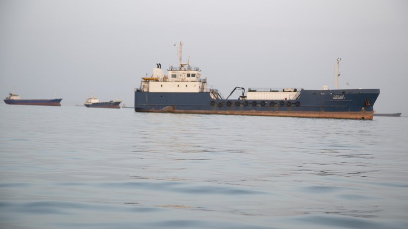 Ships are anchored near the shoreline on April 22, 2026 in Bandar Abbas, Iran.