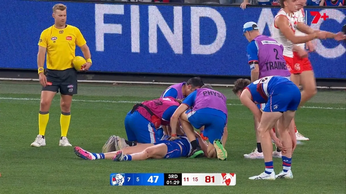 Western Bulldogs star Aaron Naughton stretchered off after ‘extreme’ head-first fall