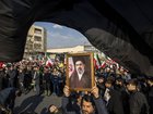 A portrait of Mojtaba Khamenei, the son of the recently killed supreme leader Ayatollah Ali Khamenei, as a crowd celebrates his appointment as his fathers successor at Enghelab Square in Tehran, Iran, on Monday, March 9, 2026. 
