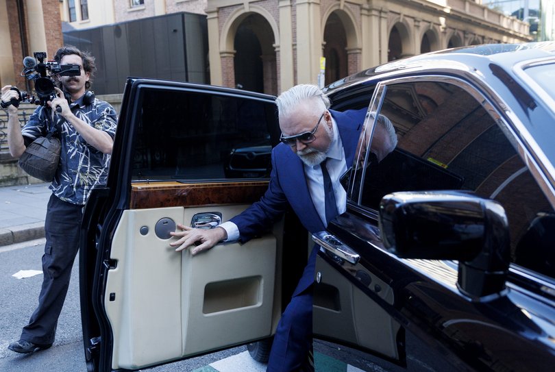 Kyle Sandilands arriver at the Federal Court on Friday in his Rolls-Royce.