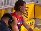 Jai Culley sits on the bench after going down with a knee injury.
