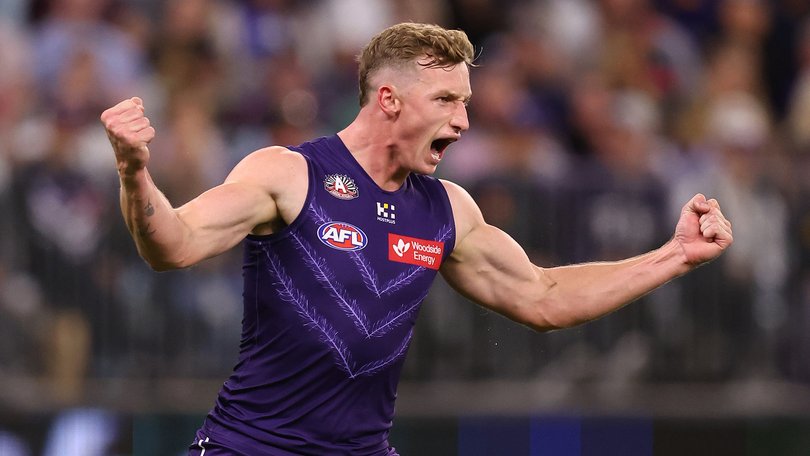 Josh Treacy of the Dockers celebrates a goal.