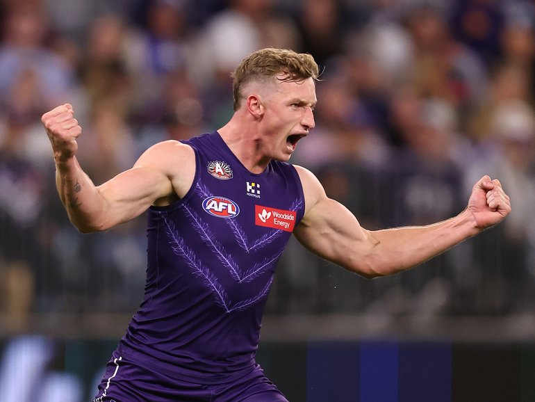 Josh Treacy of the Dockers celebrates a goal.