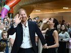 Prince Harry and Meghan greet children during their visit to the Royal Children’s Hospital in Melbourne. 