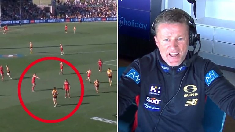 Gold Coast coach Damien Hardwick was furious when a 50m penalty was paid against his team.
