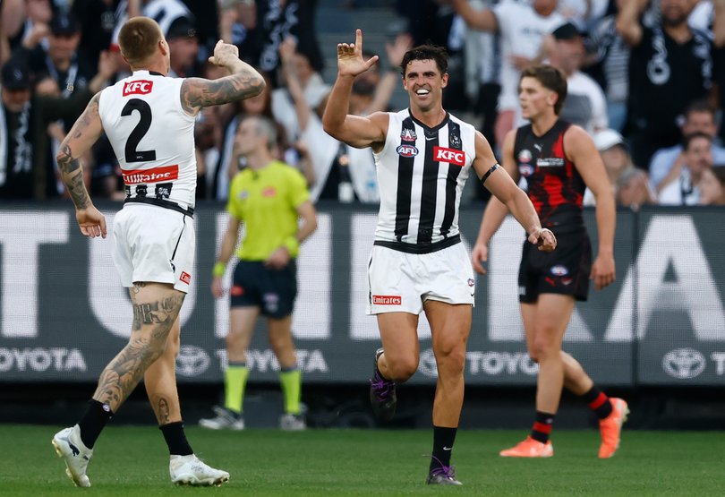 Scott Pendlebury of the Magpies celebrates a goal