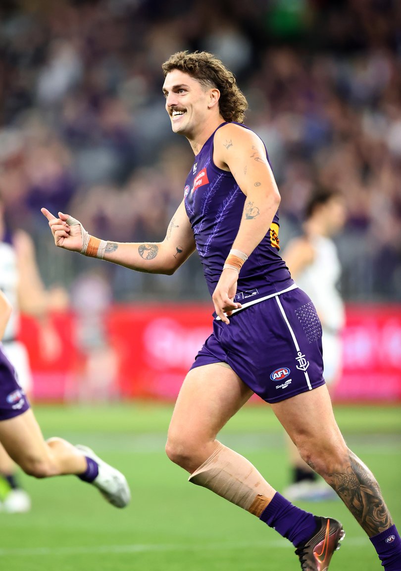 Luke Jackson celebrates a goal.
