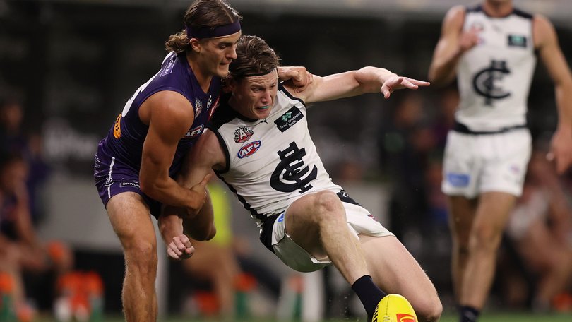 Murphy Reid chased down Sam Walsh.